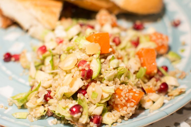 Shredded Brussels Sprout, Sweet Potato and Pomegranate Quinoa Salad - Our Kind of Wonderful